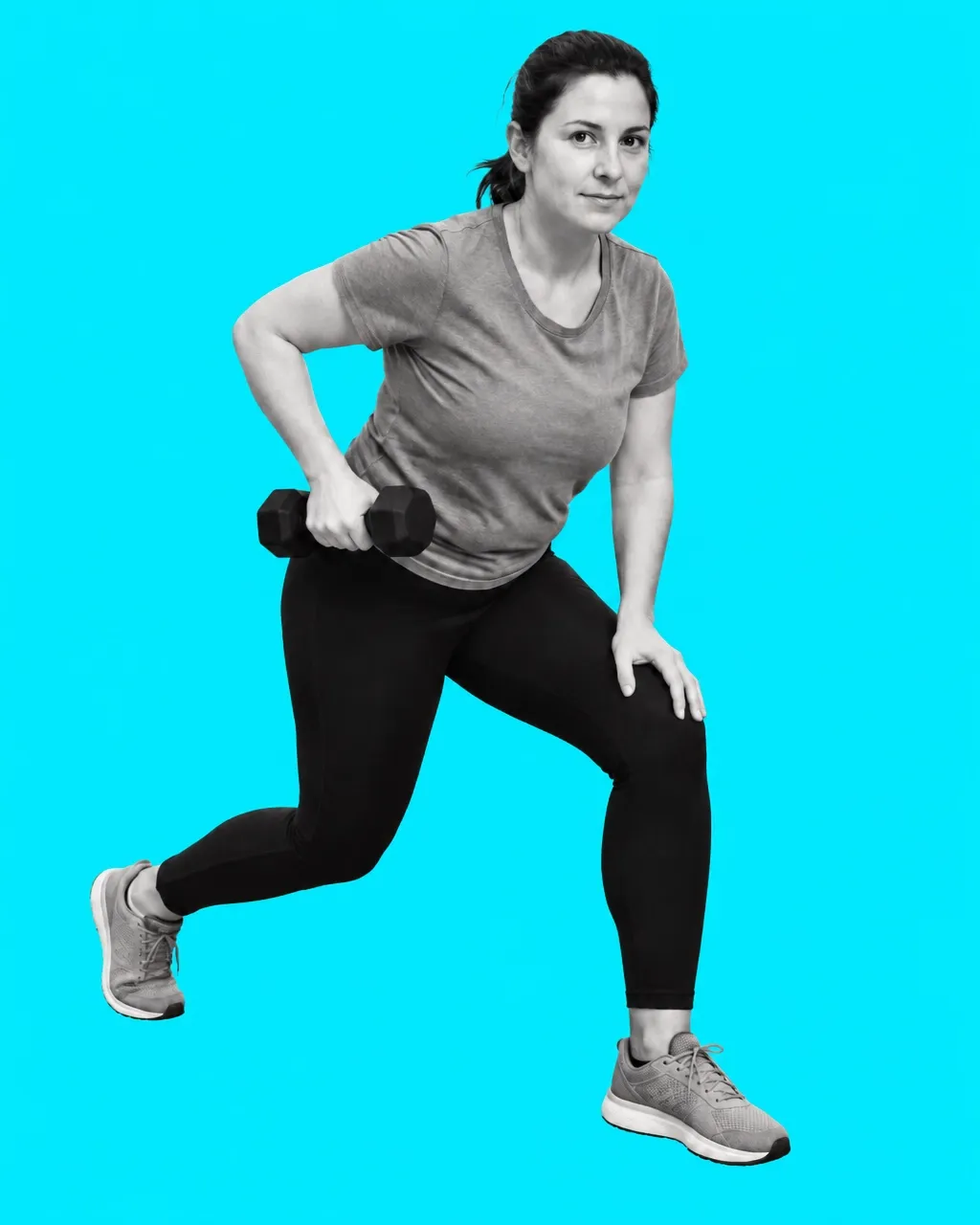 Everyday woman performing a split squat with a dumbbell